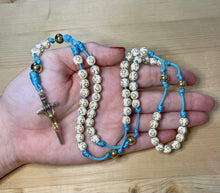 Load image into Gallery viewer, Aqua Paracord - Cream Acrylic Cross & Steel Gold Bead Rosary